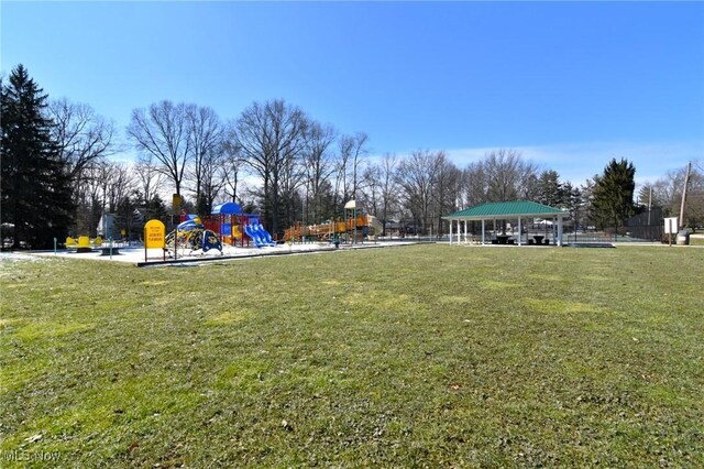 view of yard with playground community and a gazebo