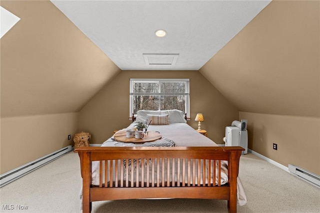 bedroom featuring a baseboard heating unit, carpet flooring, and baseboards