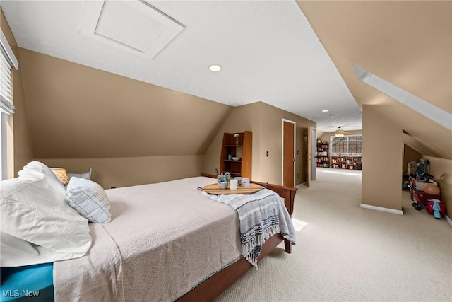 bedroom featuring attic access, baseboards, vaulted ceiling, carpet flooring, and recessed lighting