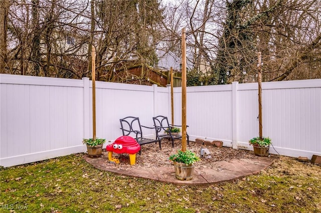 view of yard with a fenced backyard