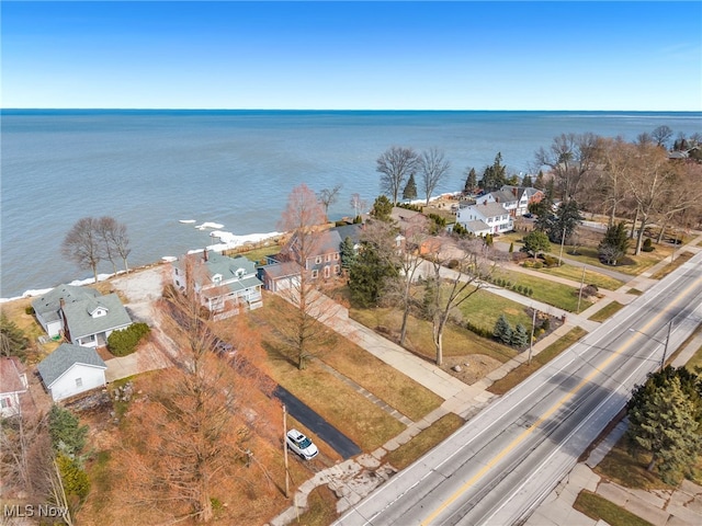 birds eye view of property featuring a residential view and a water view