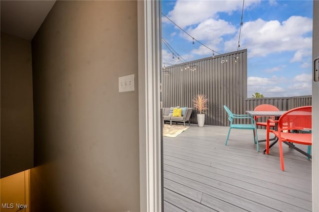 deck featuring outdoor dining space