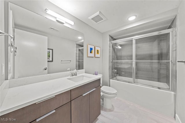 full bath with toilet, recessed lighting, shower / bath combination with glass door, visible vents, and vanity