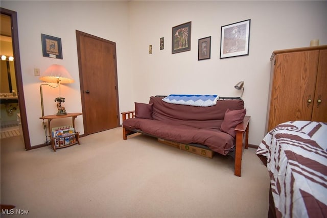 sitting room with carpet and baseboards