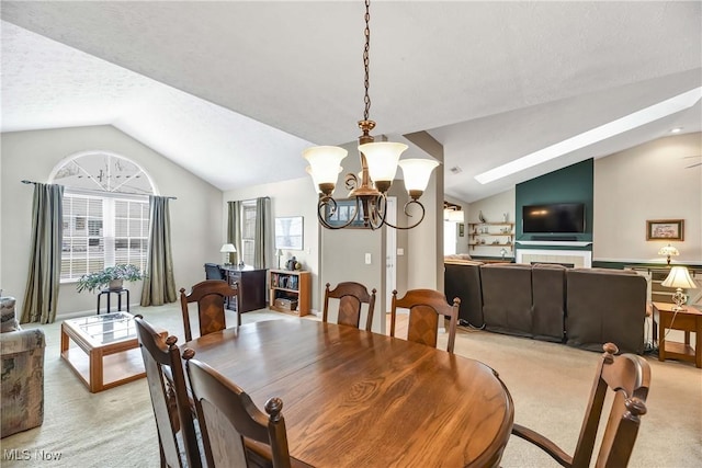 dining room with light carpet, a textured ceiling, a notable chandelier, and lofted ceiling