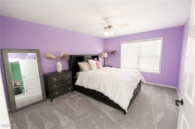 bedroom with carpet floors, baseboards, and a ceiling fan