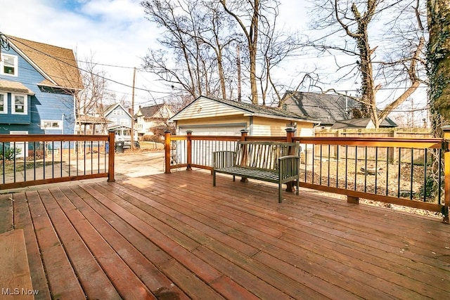 deck featuring a residential view and an outbuilding