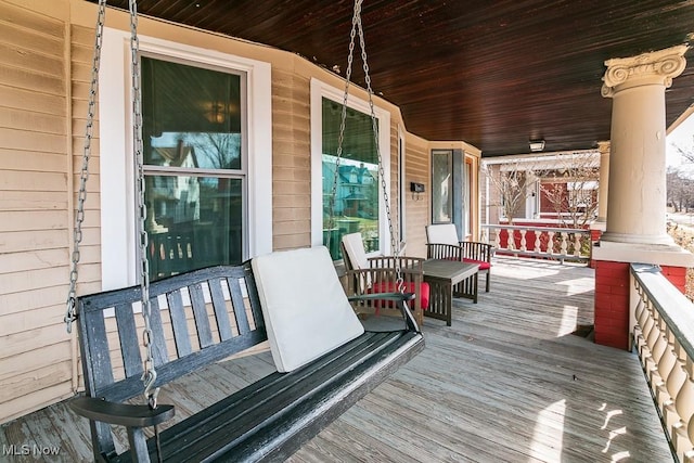 deck featuring covered porch