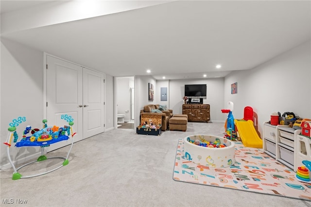 playroom with carpet floors and recessed lighting