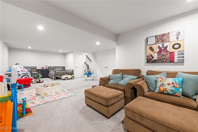 living room featuring carpet floors and recessed lighting