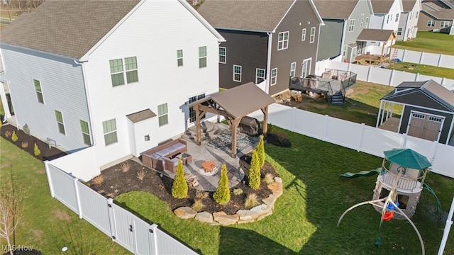 birds eye view of property with a residential view