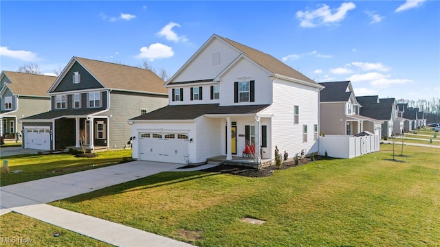 traditional-style house with an attached garage, fence, a residential view, driveway, and a front lawn