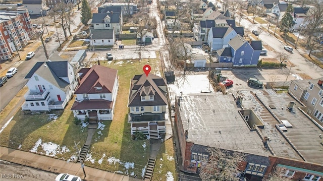 birds eye view of property with a residential view