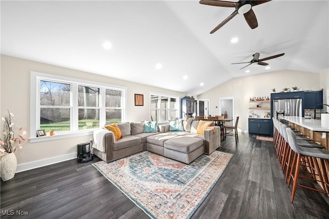 living area with vaulted ceiling, dark wood-style flooring, recessed lighting, and baseboards