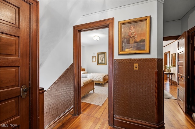 hallway with light wood-style floors