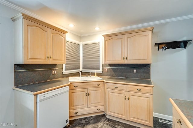 kitchen featuring dishwasher, backsplash, crown molding, light brown cabinetry, and a sink