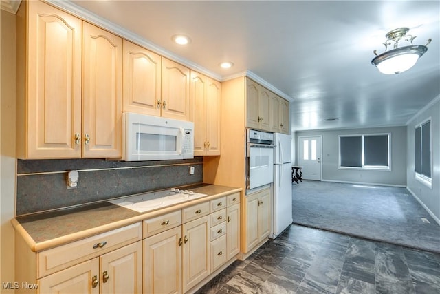 kitchen featuring dark colored carpet, decorative backsplash, open floor plan, white appliances, and baseboards