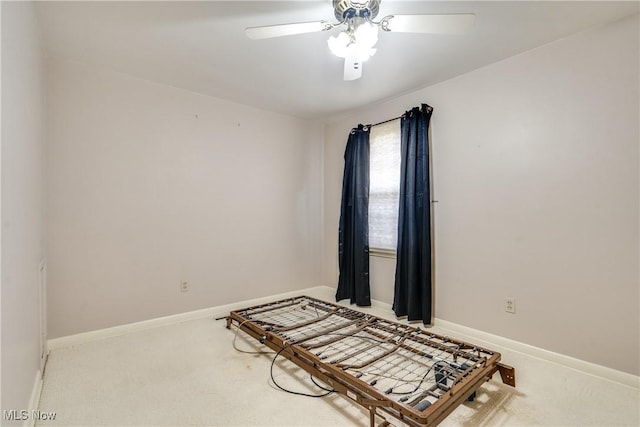 bedroom featuring carpet flooring, a ceiling fan, and baseboards