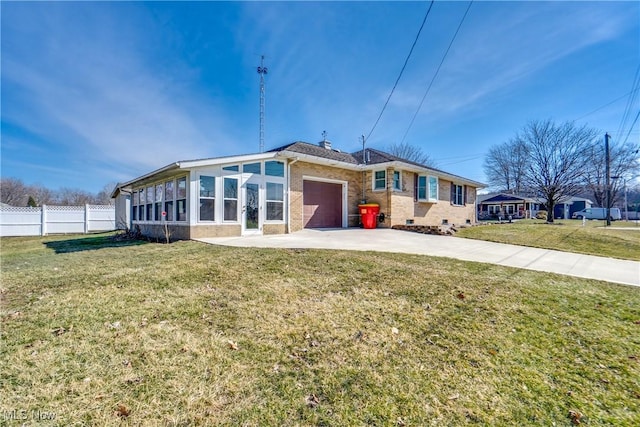 view of front facade featuring concrete driveway, an attached garage, fence, a front lawn, and brick siding