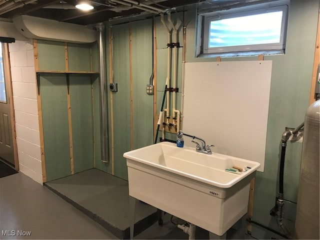 basement featuring a sink