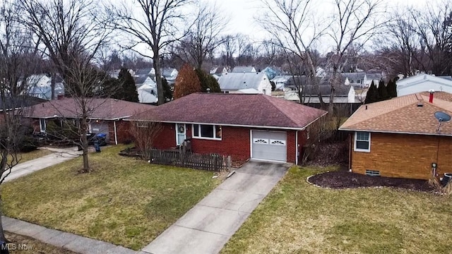 single story home featuring brick siding, a front yard, crawl space, a garage, and driveway