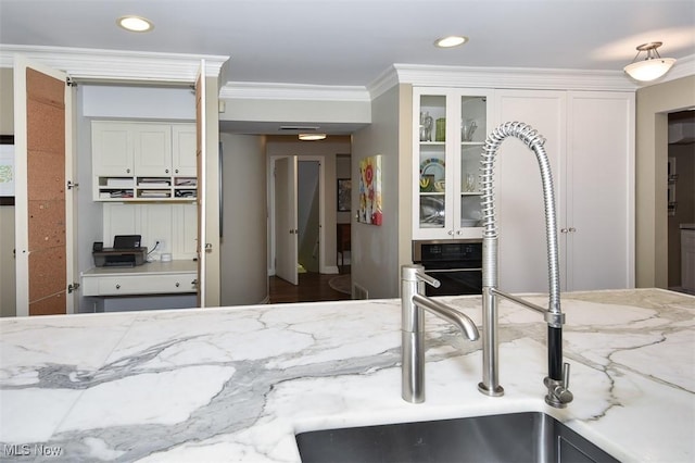 bedroom with crown molding and recessed lighting