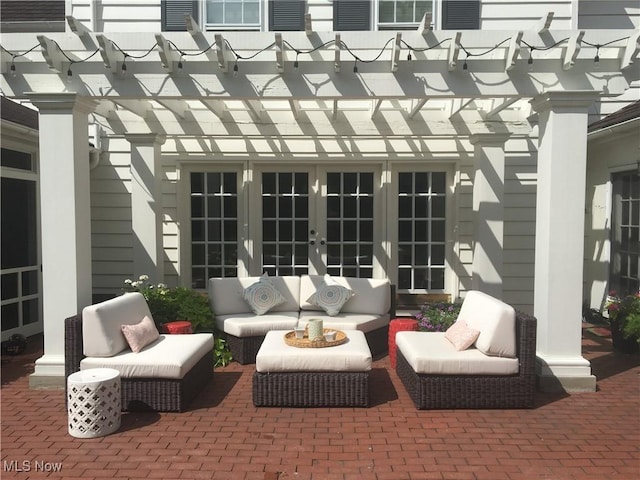 view of patio featuring an outdoor hangout area, a pergola, and french doors