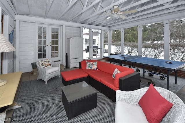 sunroom with french doors and a ceiling fan