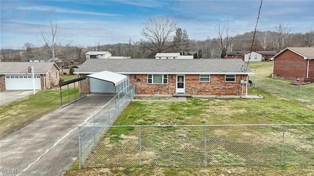 view of front of property with brick siding, a fenced front yard, and a front yard