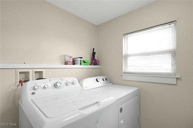 clothes washing area with laundry area and independent washer and dryer