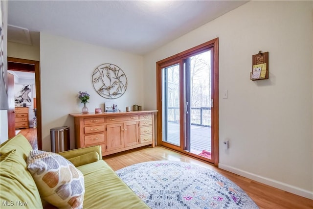 interior space with light wood-type flooring and baseboards