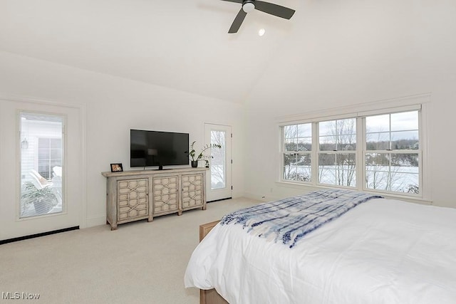 carpeted bedroom with ceiling fan, high vaulted ceiling, and baseboards