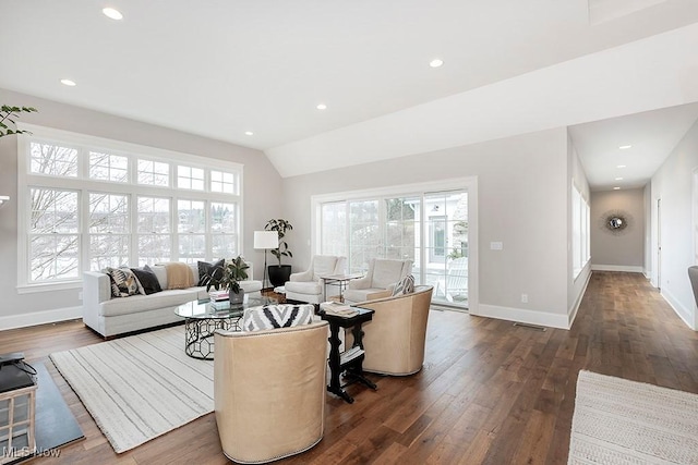 living area with dark wood-type flooring, recessed lighting, a healthy amount of sunlight, and baseboards