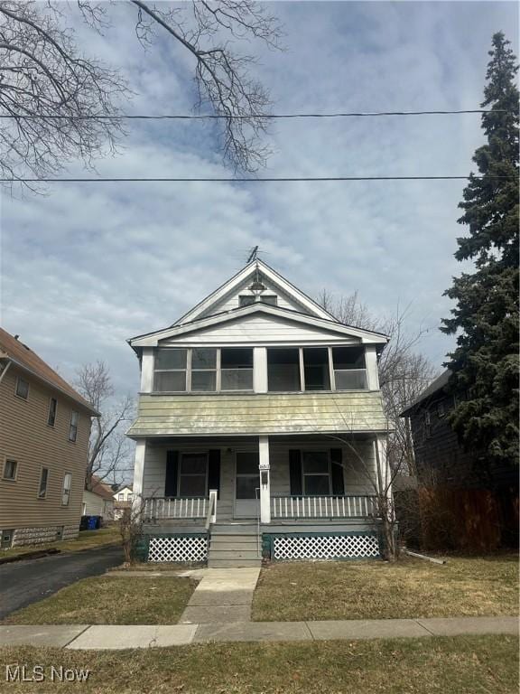 view of front of property featuring covered porch and driveway