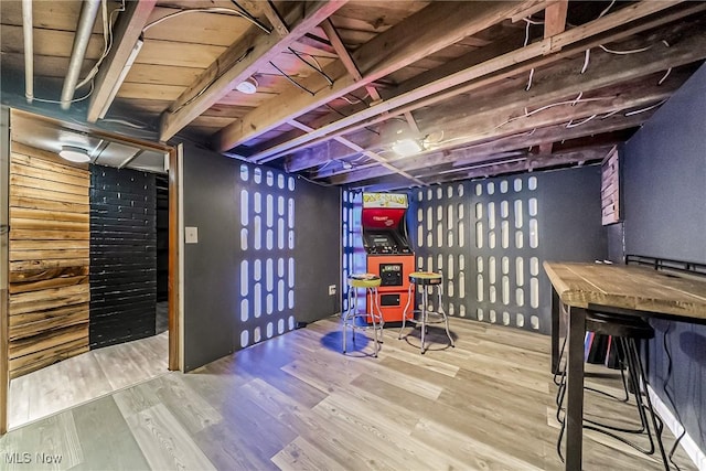 recreation room featuring wood finished floors