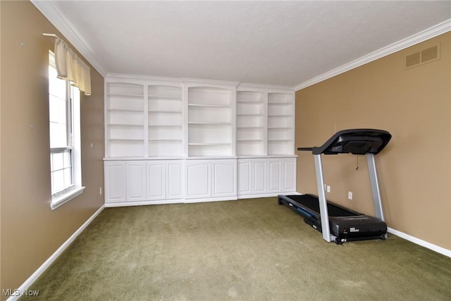 workout room featuring baseboards, carpet floors, visible vents, and crown molding