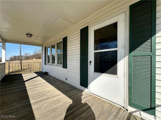 wooden deck featuring a porch