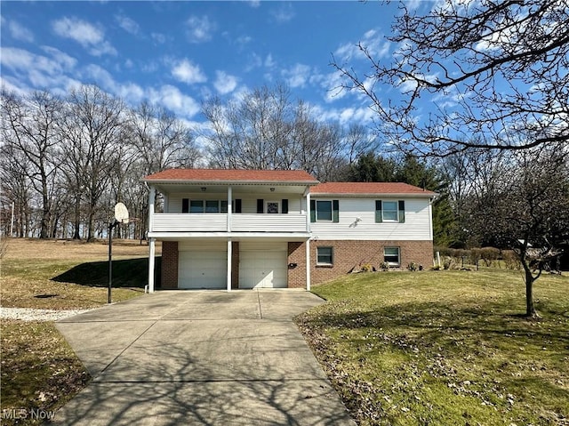 view of front facade with driveway, a balcony, an attached garage, a front yard, and brick siding