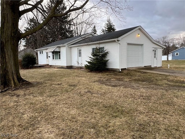 exterior space featuring driveway and an attached garage