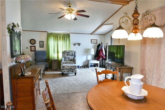 carpeted living room featuring a ceiling fan, lofted ceiling with beams, and a textured ceiling