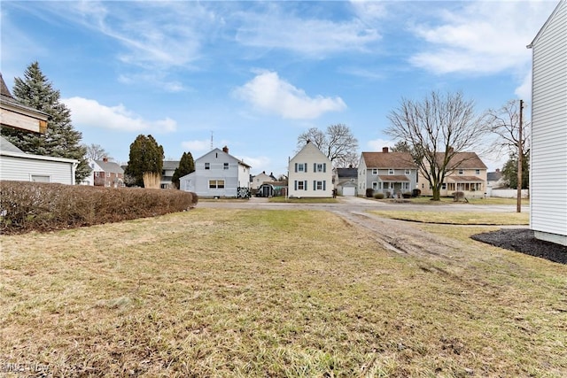 view of yard with a residential view