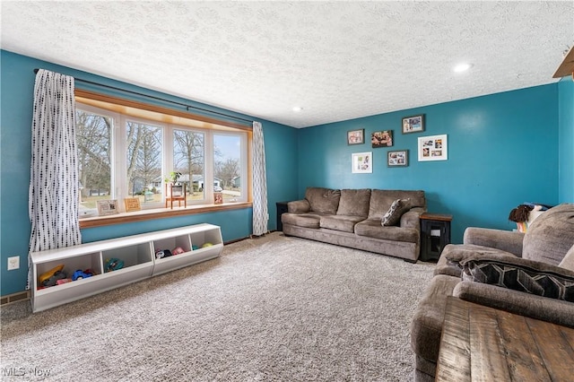 living area featuring a textured ceiling, baseboards, and carpet flooring