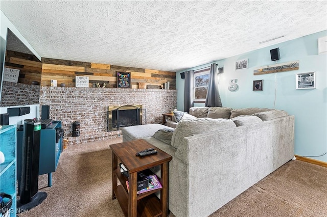 living area with visible vents, a brick fireplace, carpet flooring, wood walls, and a textured ceiling