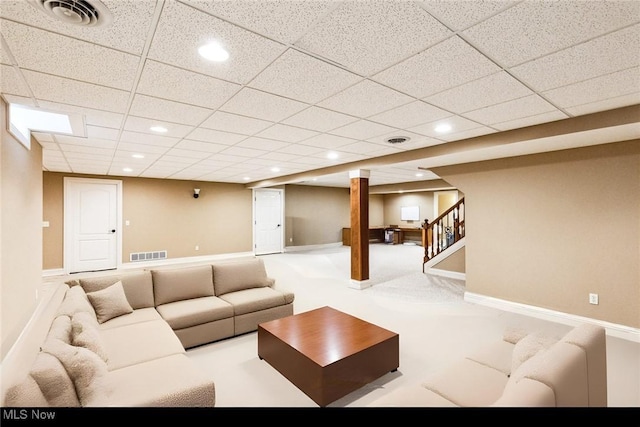 living area featuring stairs, visible vents, and recessed lighting