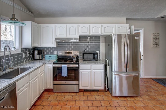 kitchen featuring a sink, white cabinets, range hood, appliances with stainless steel finishes, and decorative backsplash