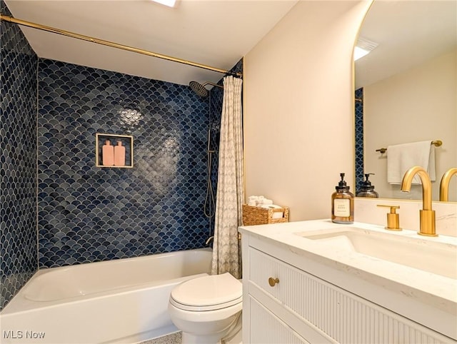 full bath with toilet, vanity, and shower / bath combination with curtain