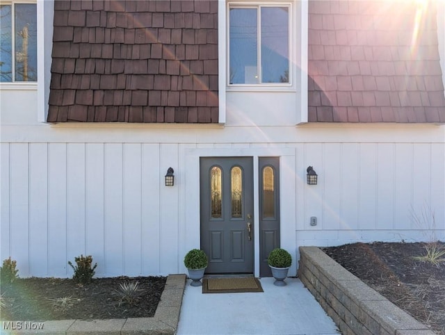 entrance to property with mansard roof