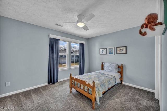 bedroom with visible vents, carpet flooring, ceiling fan, a textured ceiling, and baseboards