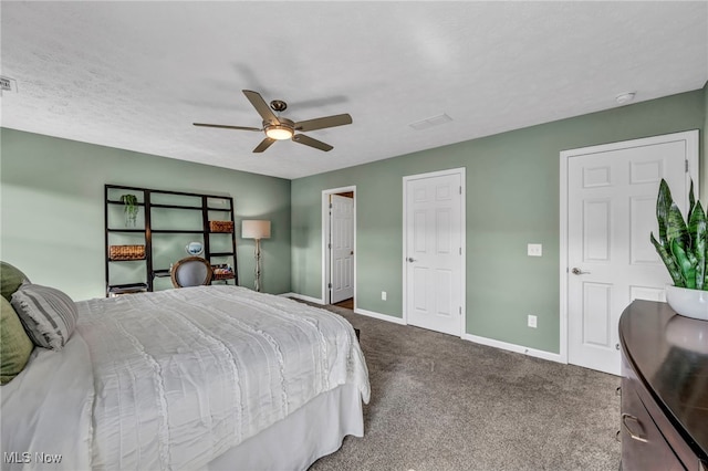 bedroom featuring carpet floors, visible vents, baseboards, and ceiling fan