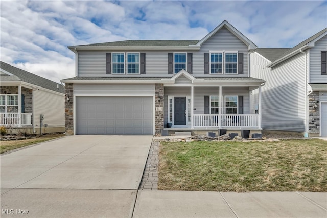 view of front facade featuring a porch, concrete driveway, an attached garage, a front yard, and stone siding